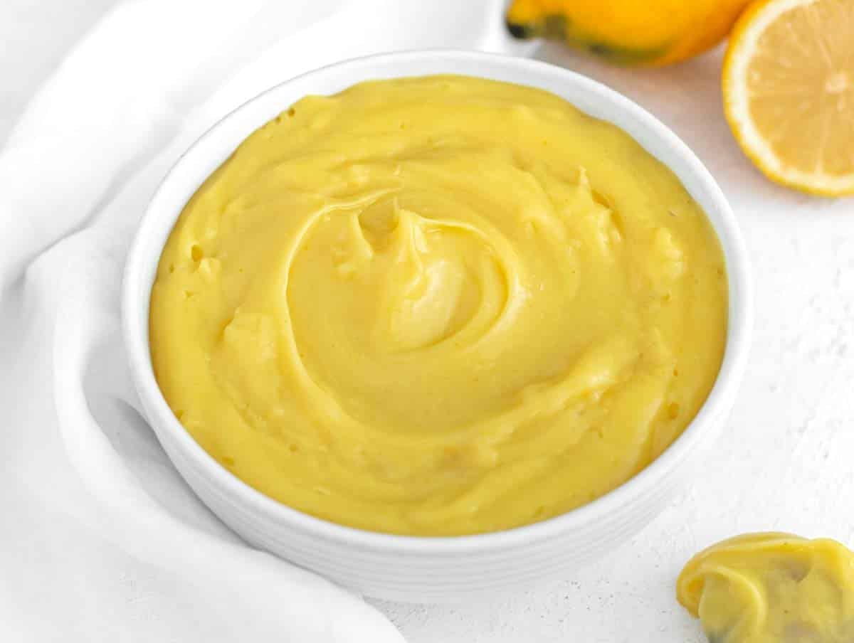 vegan lemon curd in a white bowl