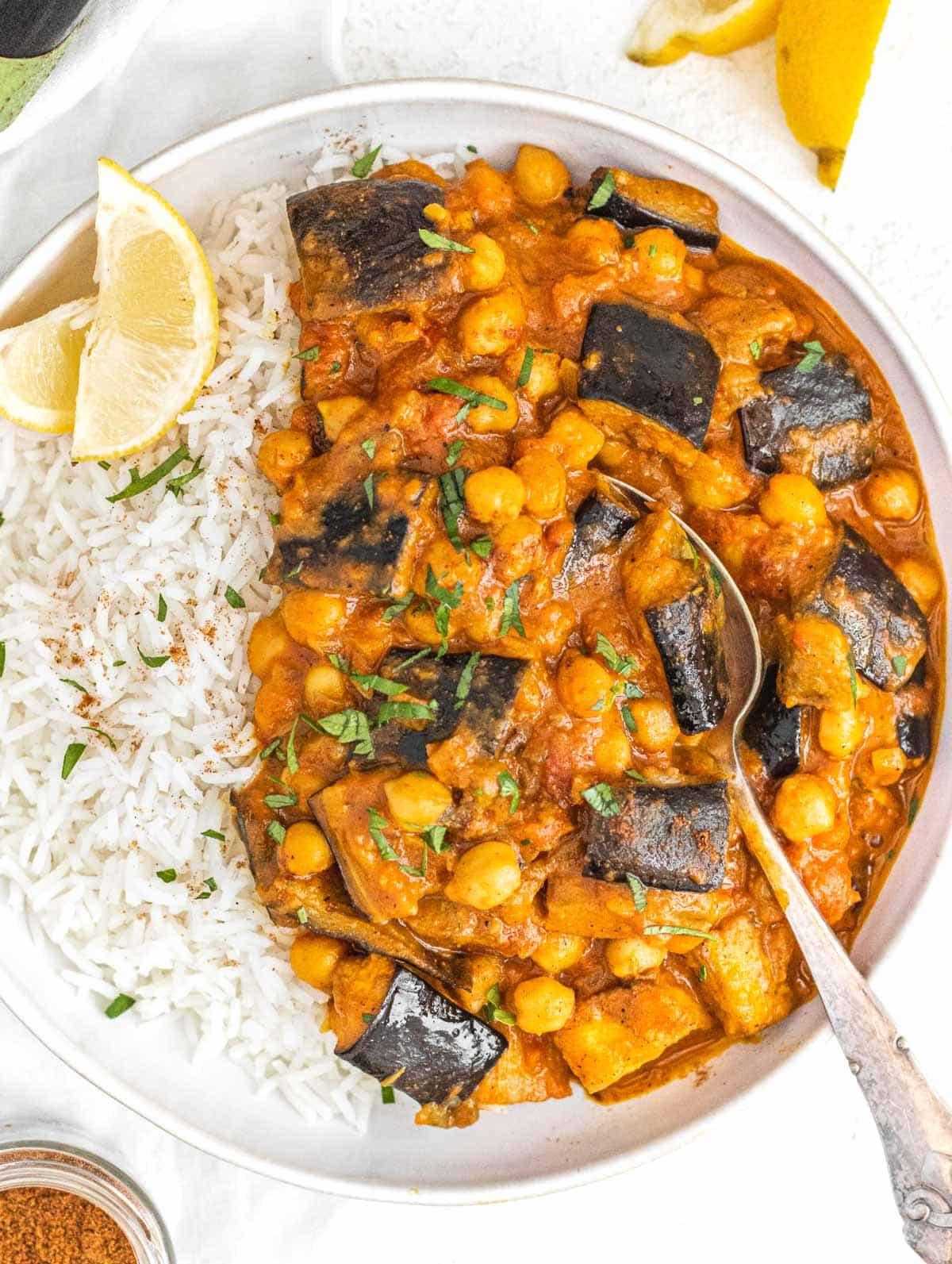 eggplant curry with silver spoon