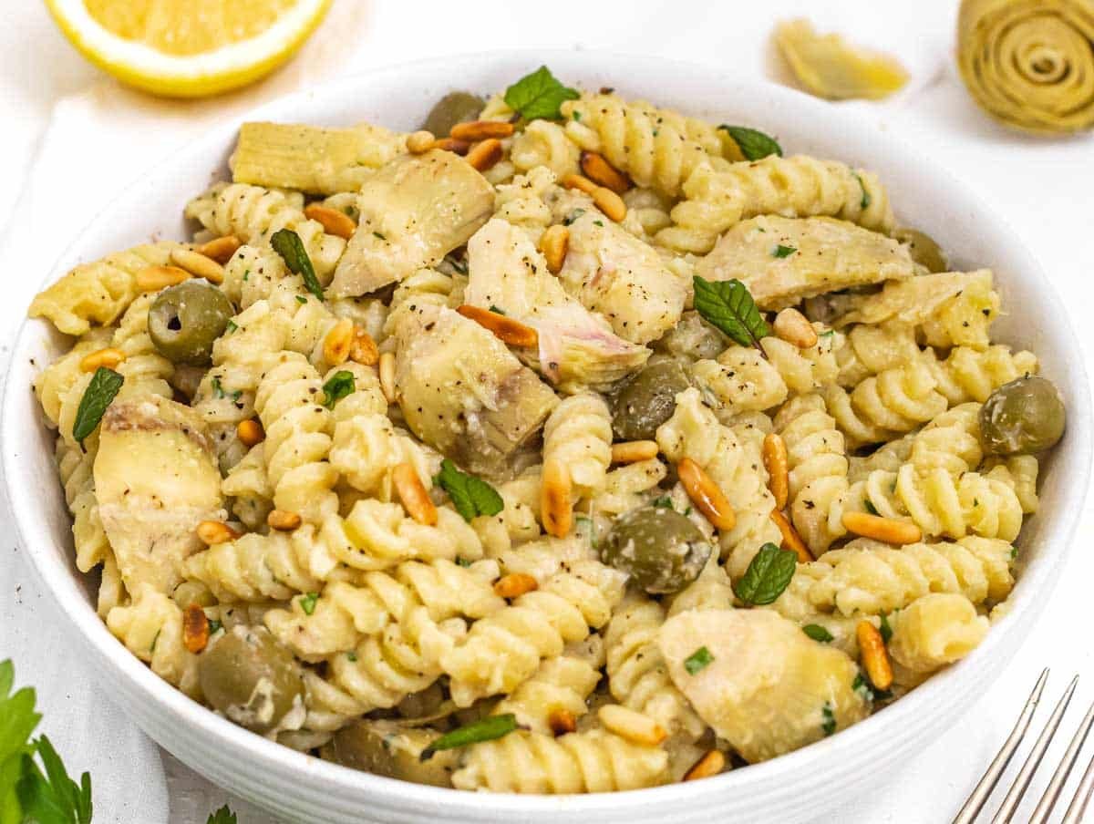 Artichoke pasta in a bowl with lemon