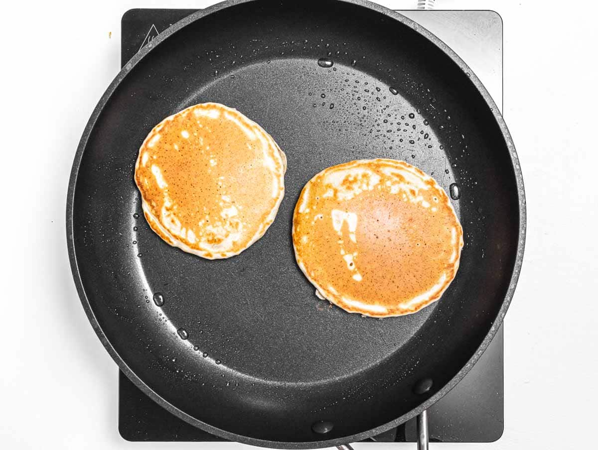 Pancakes with brown surface on a pan