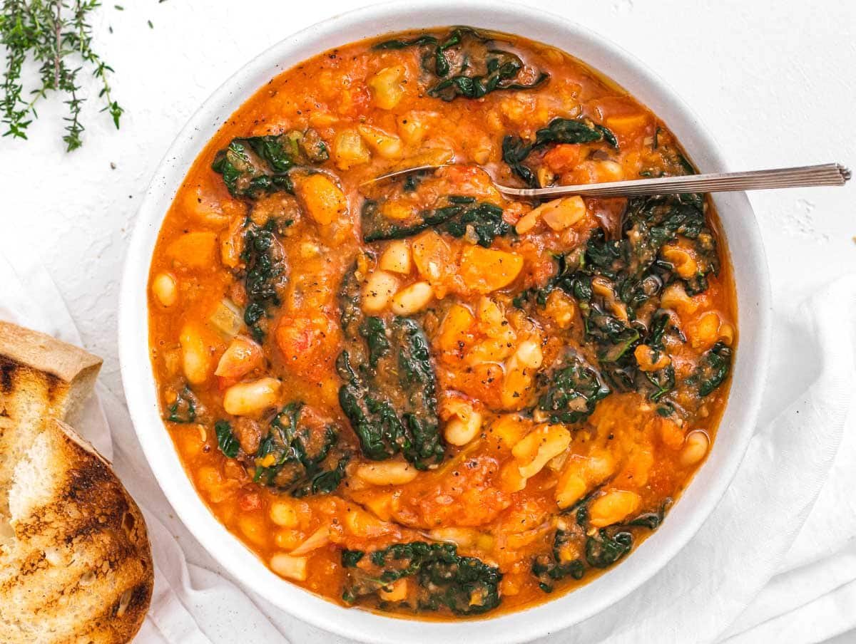 Kale soup with spoon