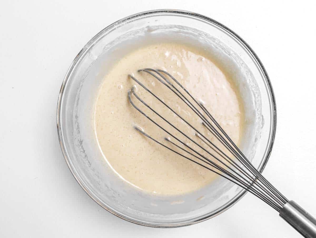 cake batter with a whisk