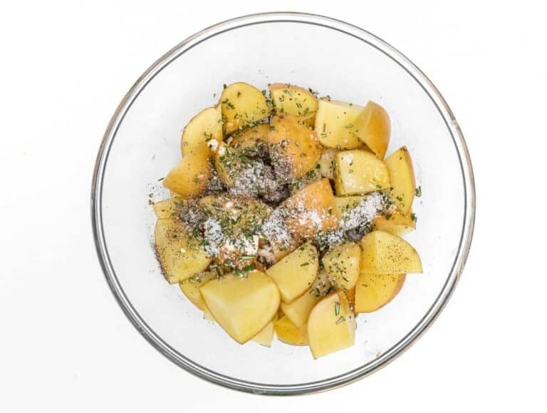 Potatoes in a bowl with herbs
