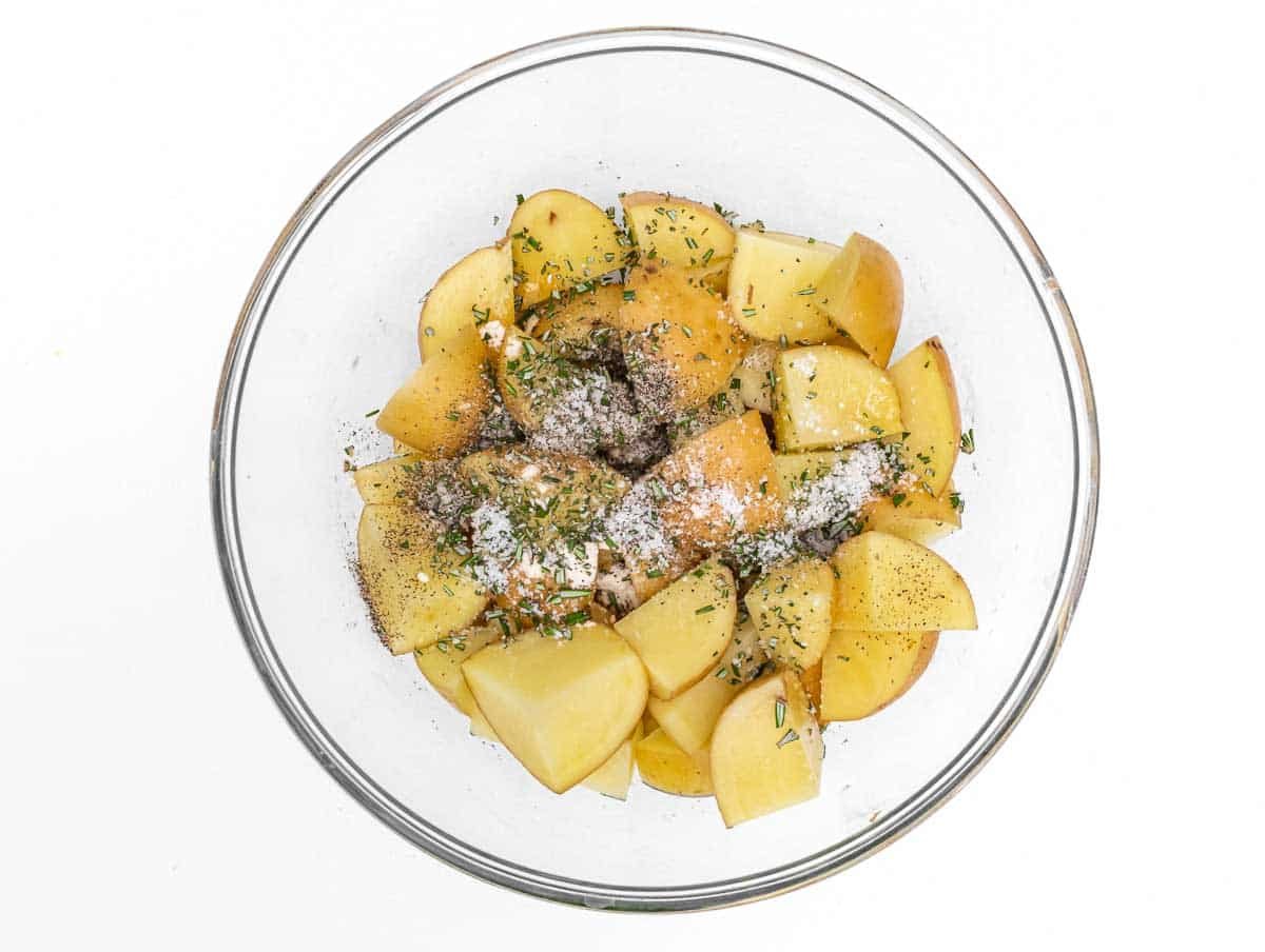 Potatoes in a bowl with herbs
