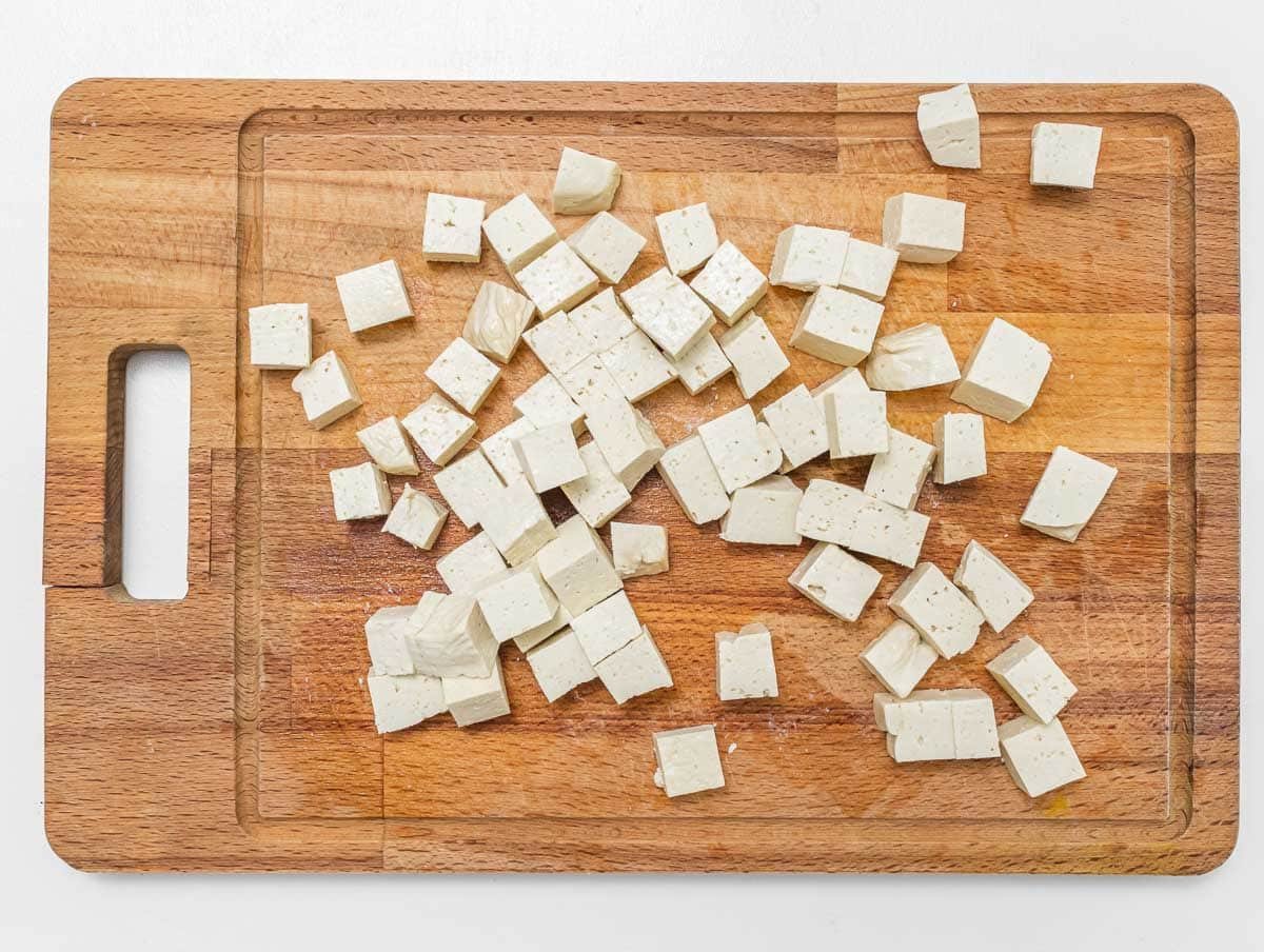 diced tofu on a cutting board