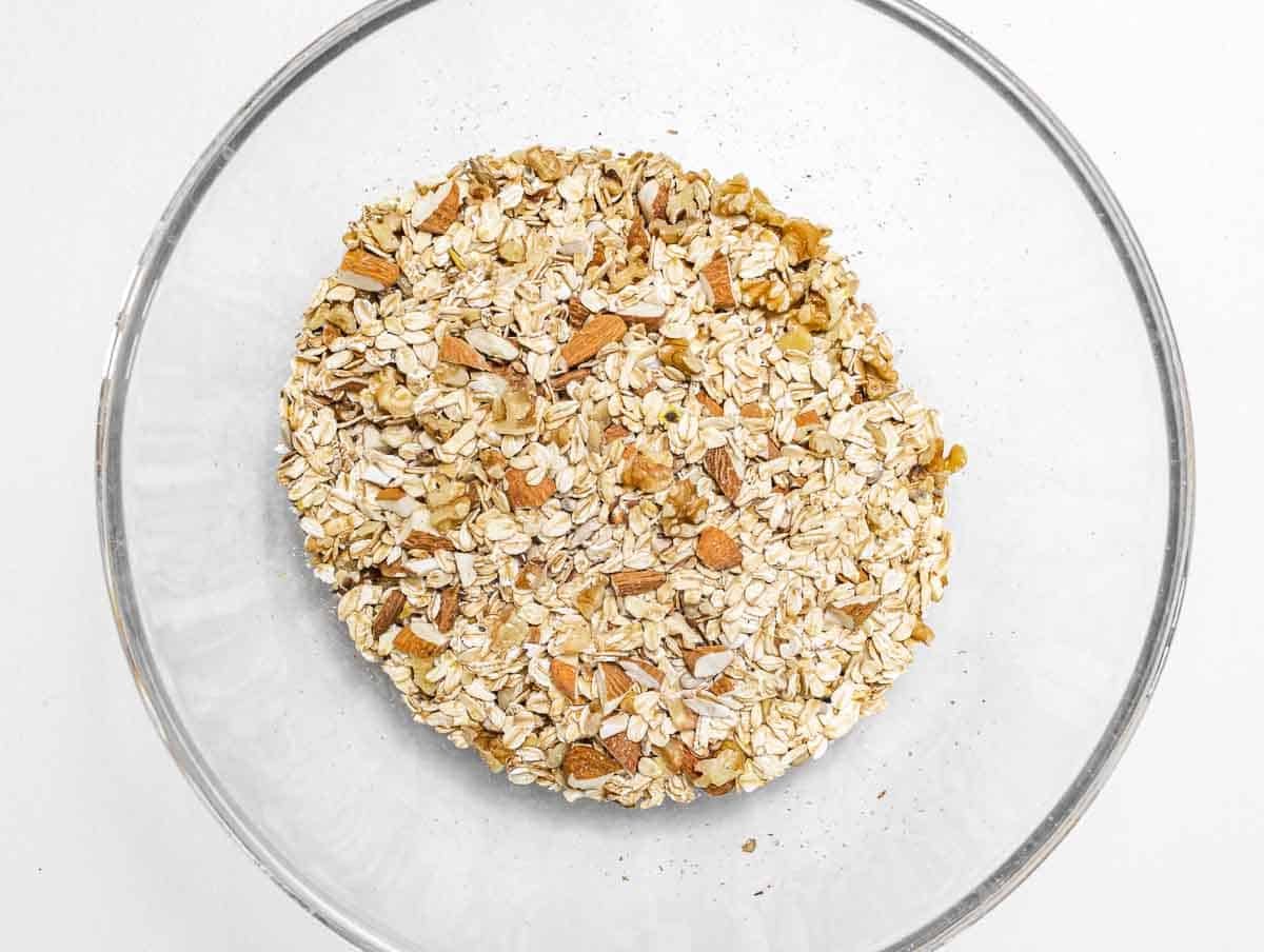 nuts and oats in a glass bowl