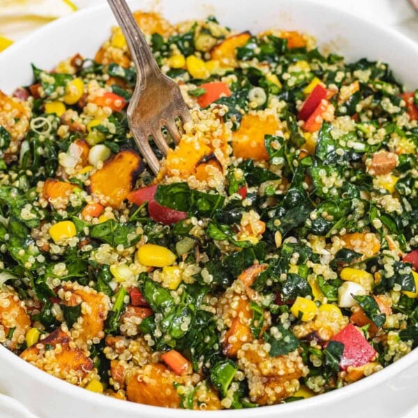 Kale quinoa salad with fork