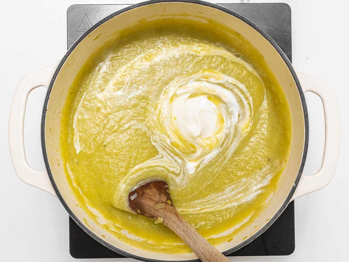 yogurt in potato soup and spoon