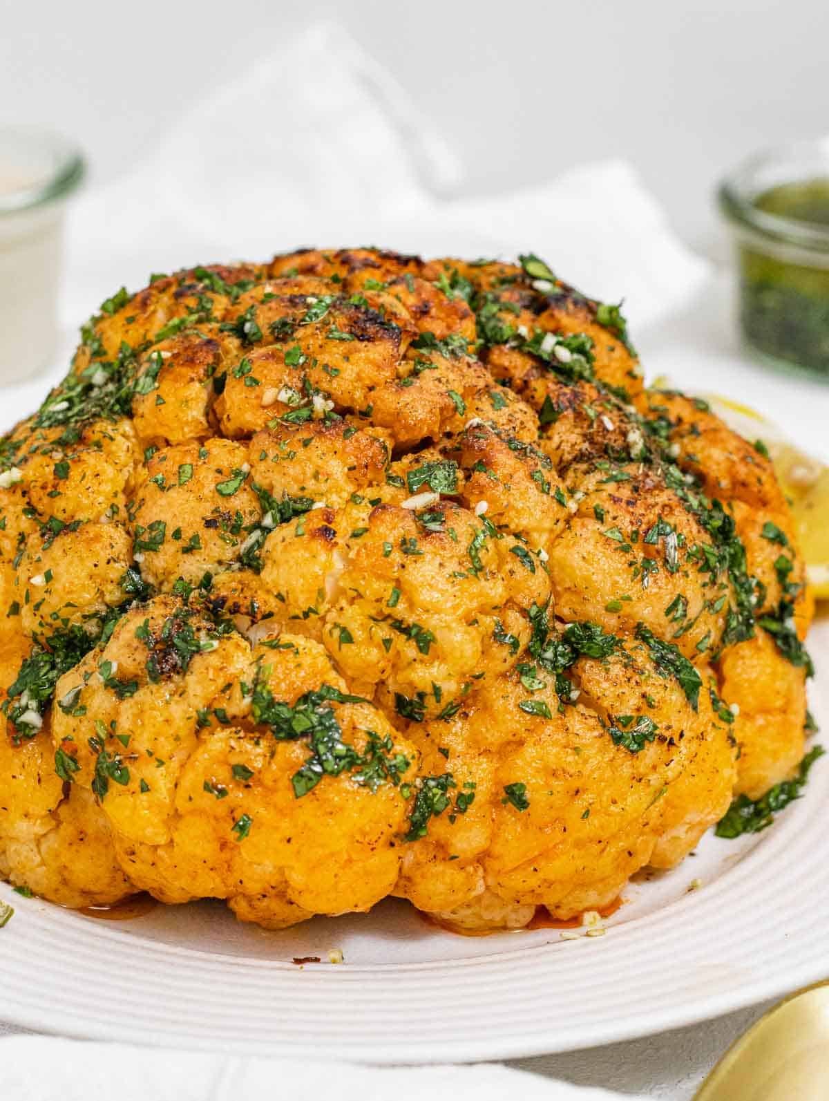 whole roasted cauliflower with dressing