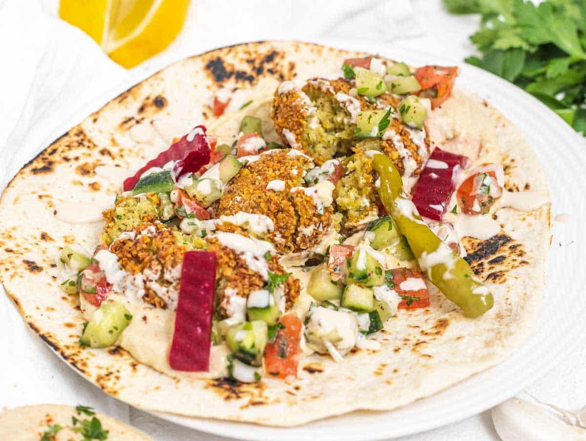 Falafel in a wrap with tahini sauce