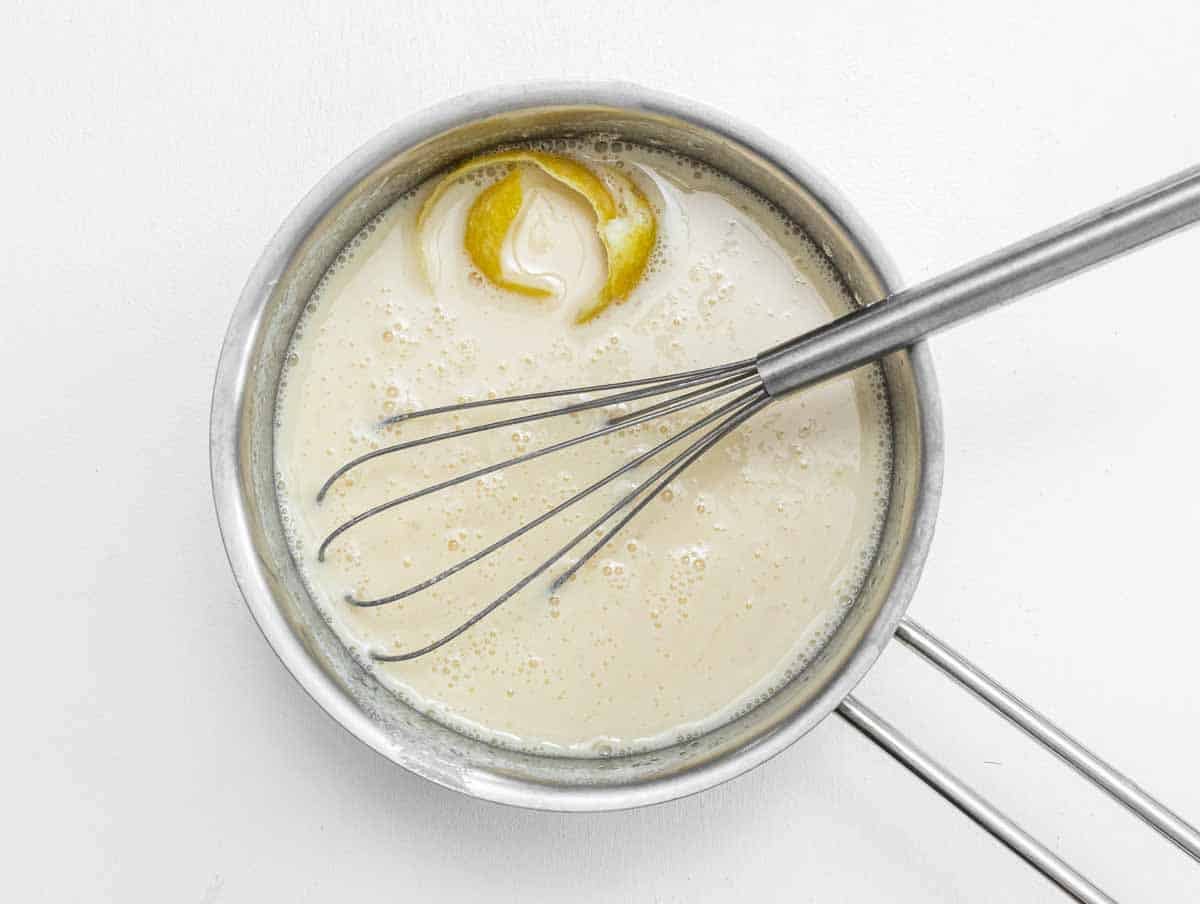 plant milk and lemon in a saucepan