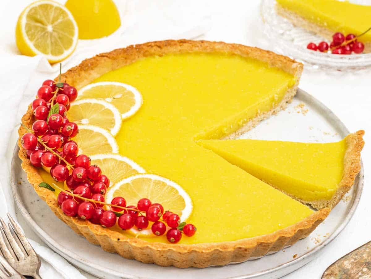 Lemon tart with slice