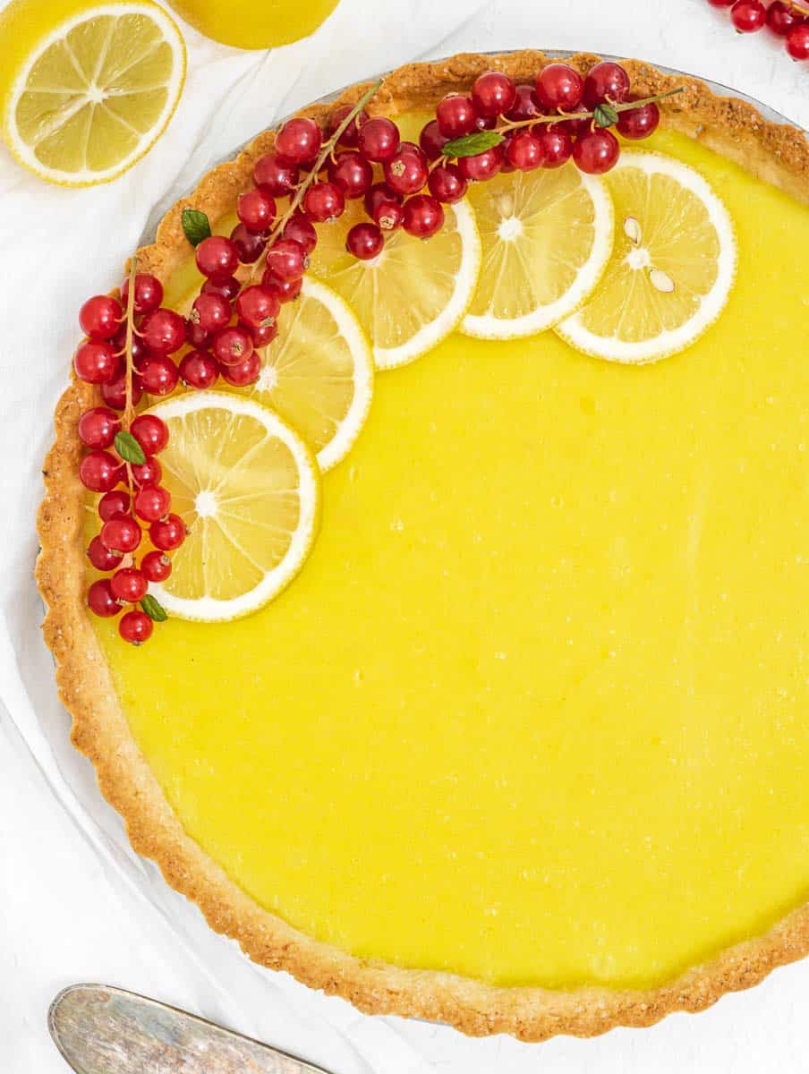 Lemon tart with lemon slices and berries