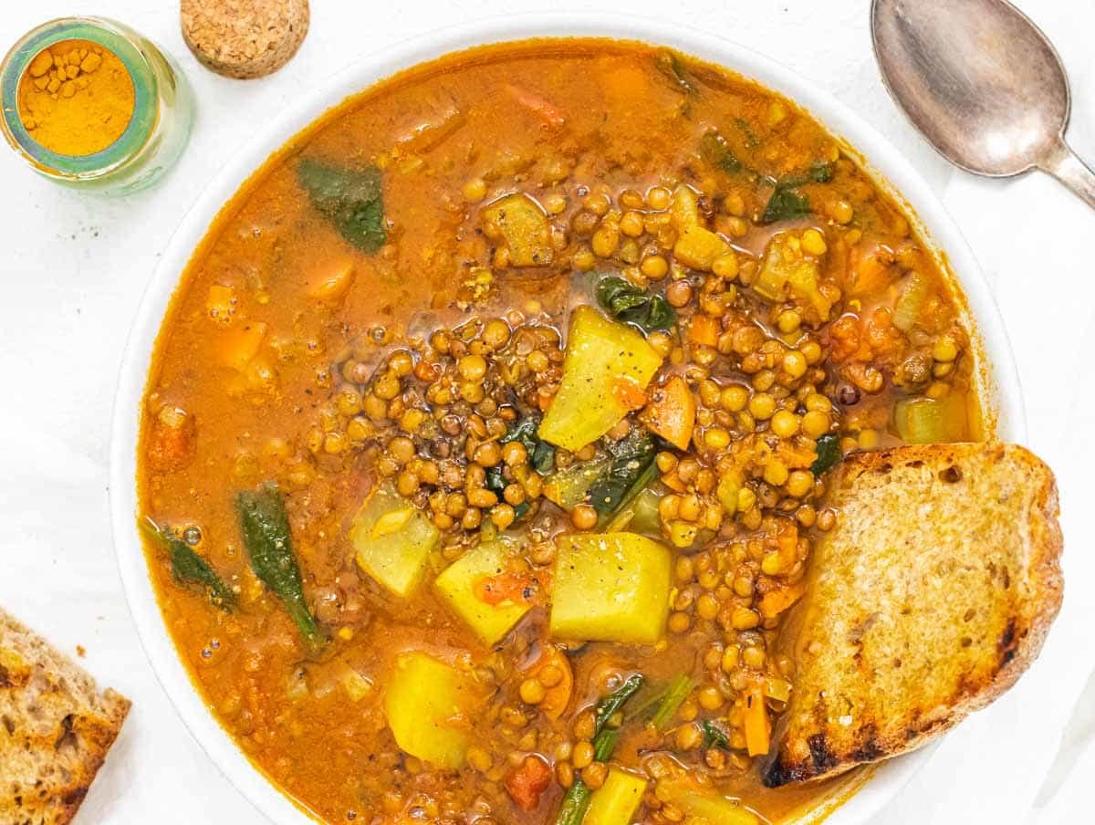 Lentil Vegetable Soup with bread and turmeric