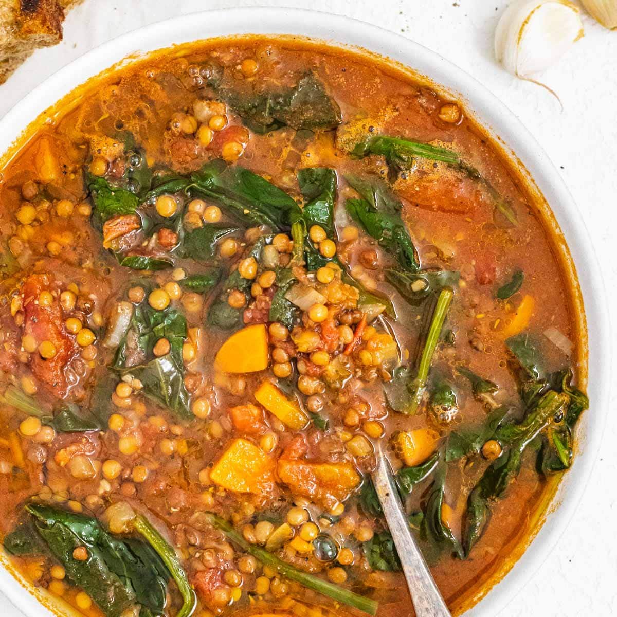Lentil vegetable soup with spoon