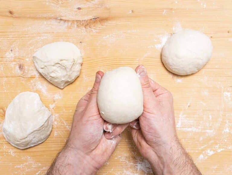 hands and dough balls