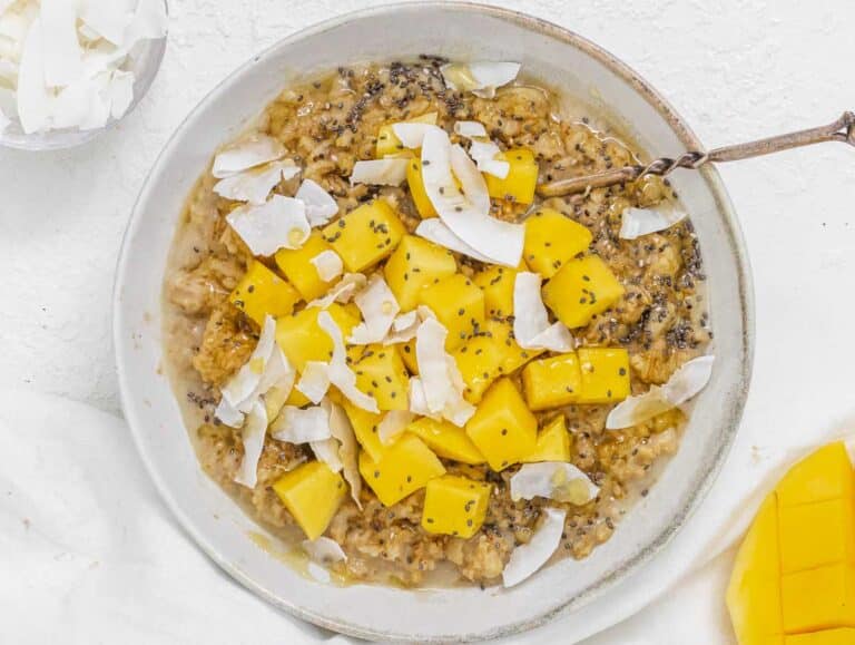 Oatmeal with coconut flakes and mango