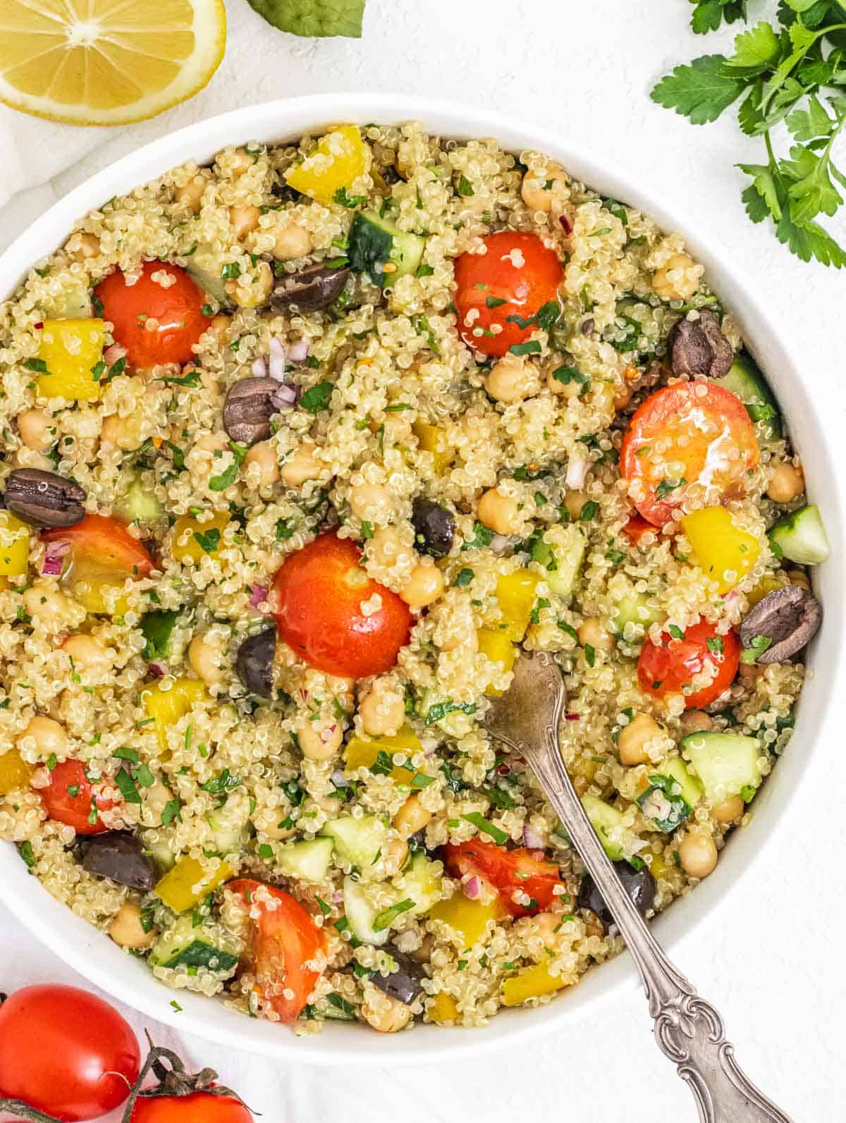 Quinoa and chickpea salad with a fork