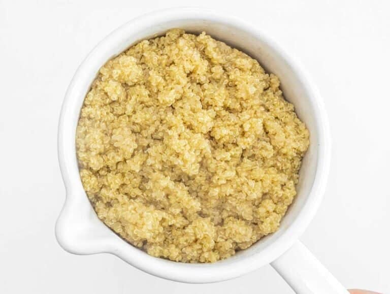cooked quinoa in a white pot