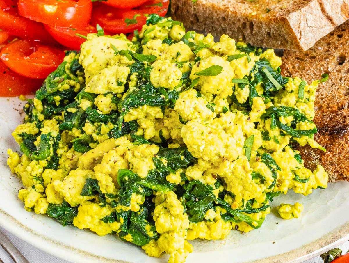 Tofu scramble with spinach on a plate