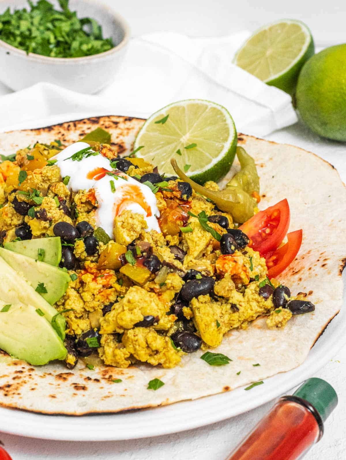 Vegan Breakfast Burrito with lime and avocado