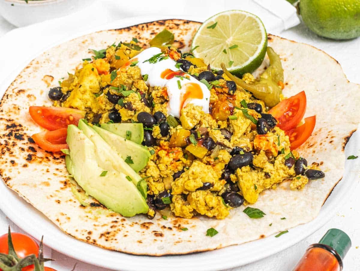 Vegan breakfast burrito with tofu scramble