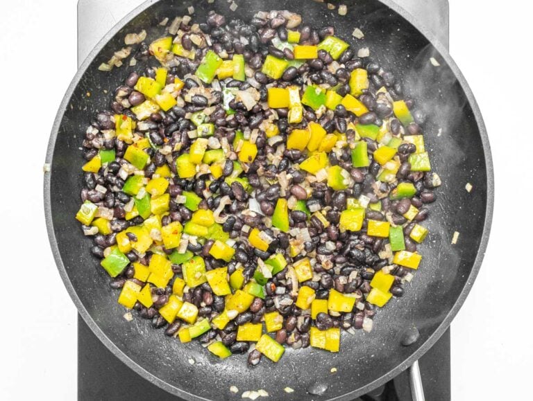black beans and vegetables in a skillet