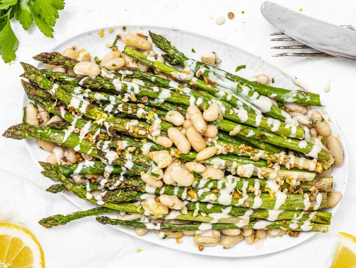 Air fryer asparagus with white beans and tahini sauce