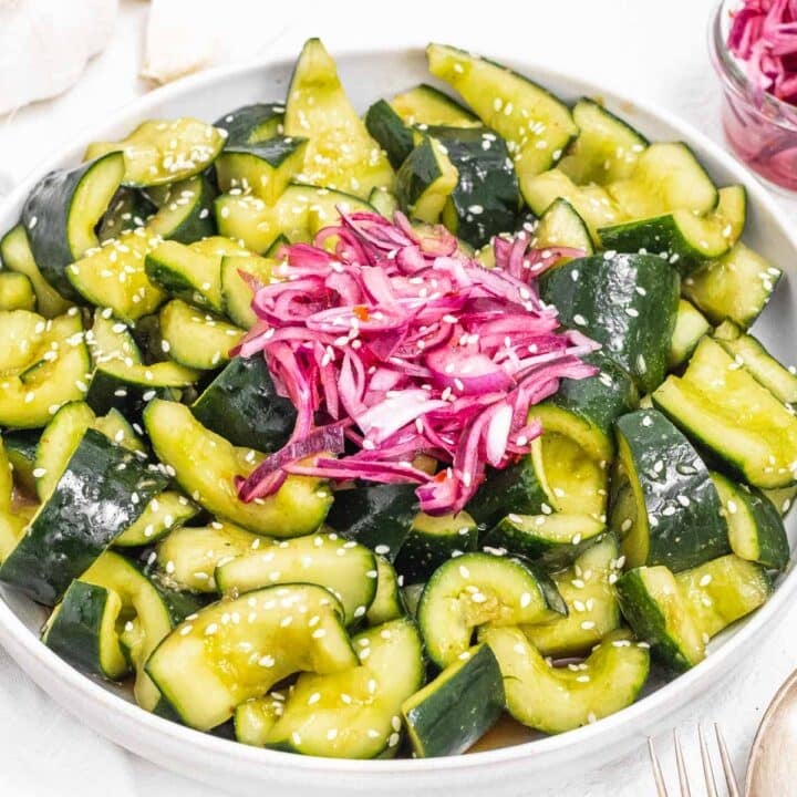 Asian cucumber salad with pickled onions and sesame seeds