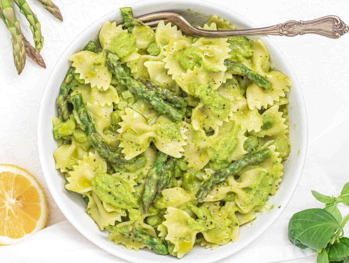 Asparagus pasta with fork and lemon