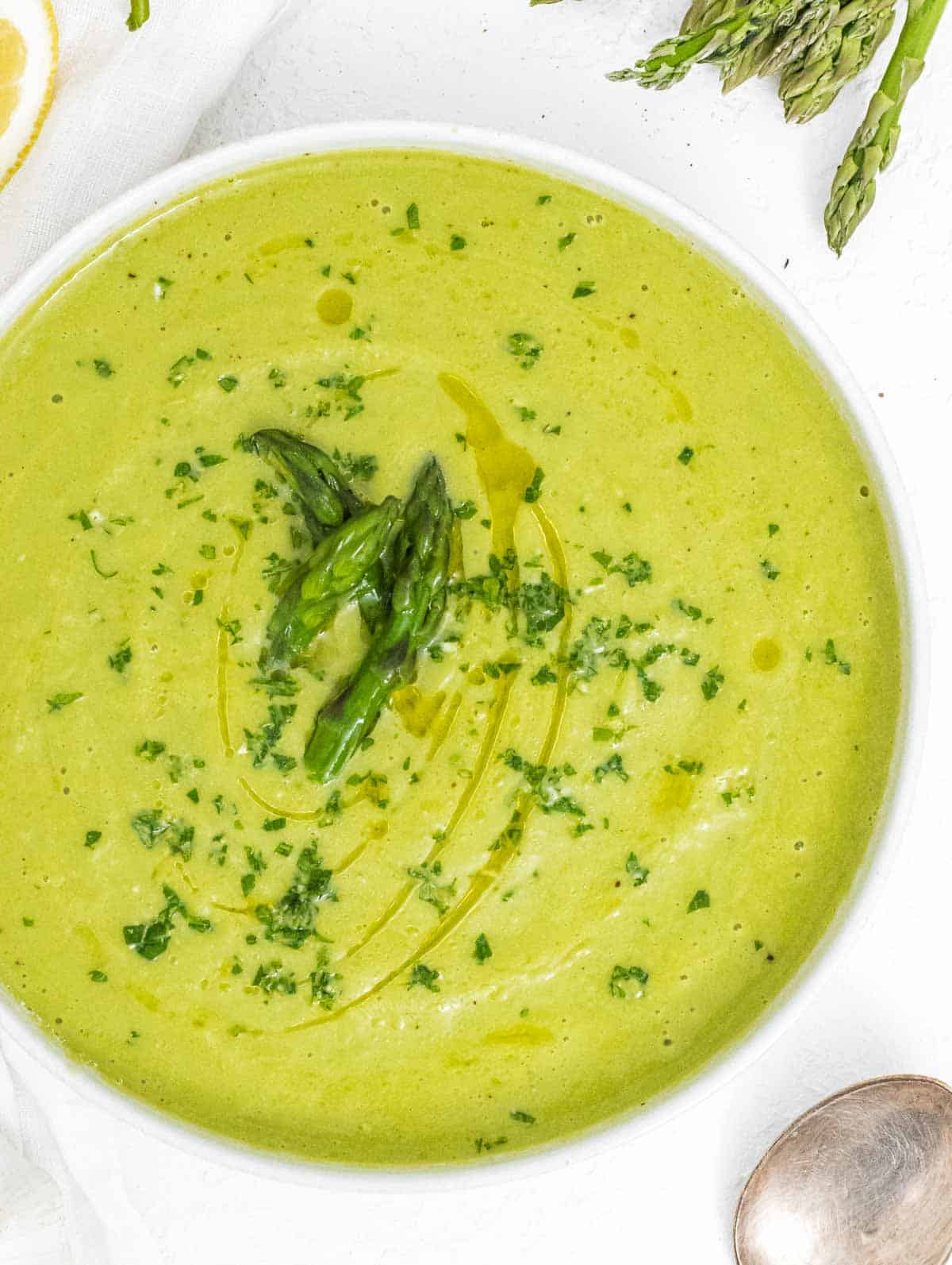 Asparagus soup with gremolata and spoon