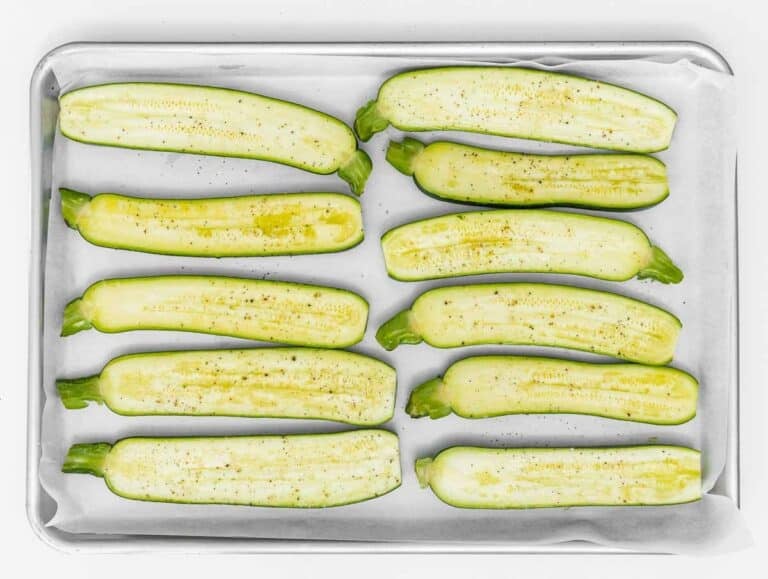brushing the zucchini with olive oil