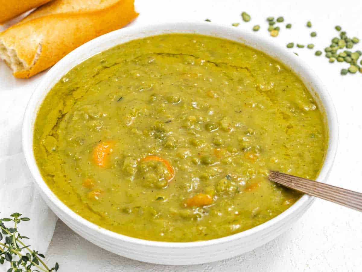 Split peas soup with silver spoon