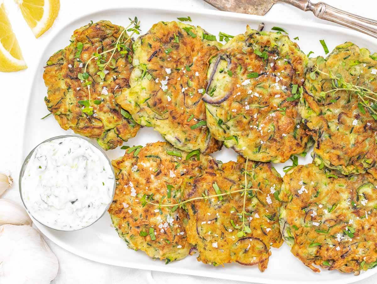 Zucchini fritters with tzatziki and lemon