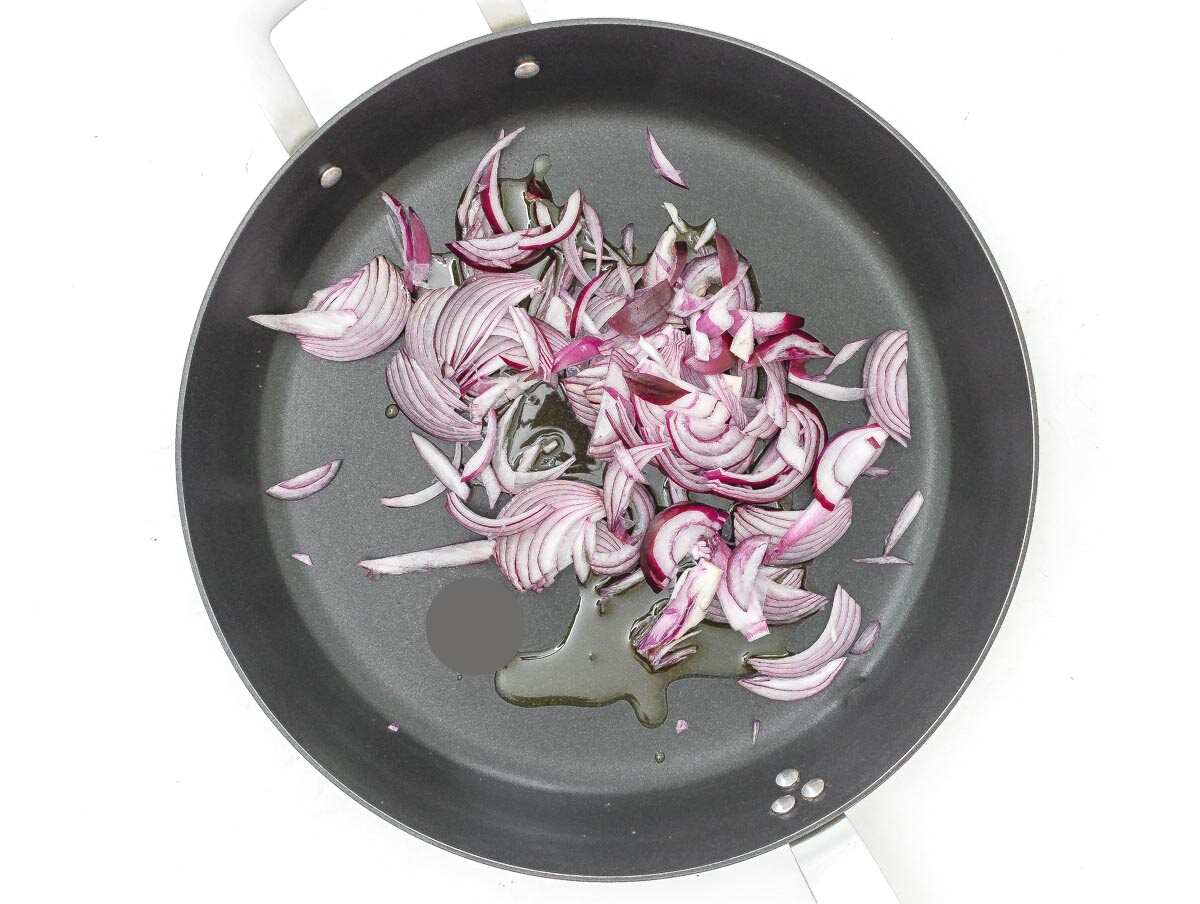 frying the onion in a pan