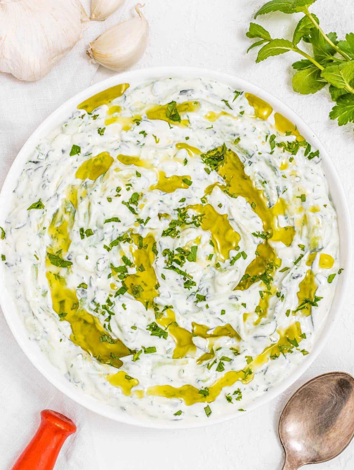 tzatziki in a bowl with olive oil