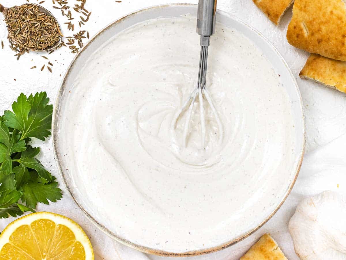 Yogurt Tahini Dressing with bread and lemon