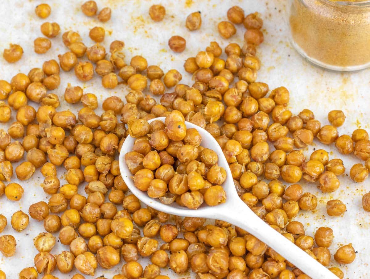 Roasted chickpeas with white spoon