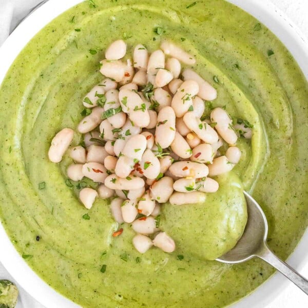Zucchini soup with white beans and chili flakes