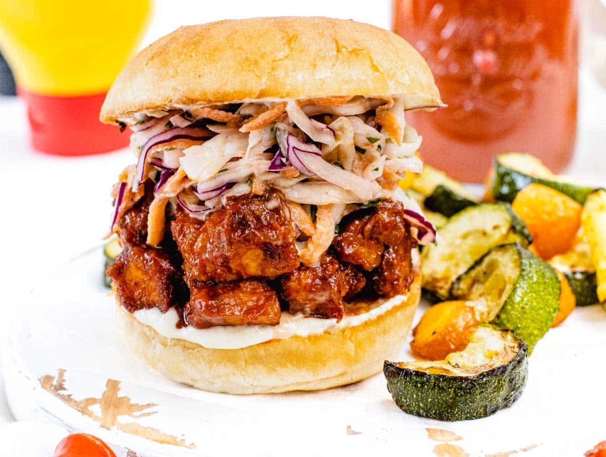 BBQ sauce in a burger with coleslaw