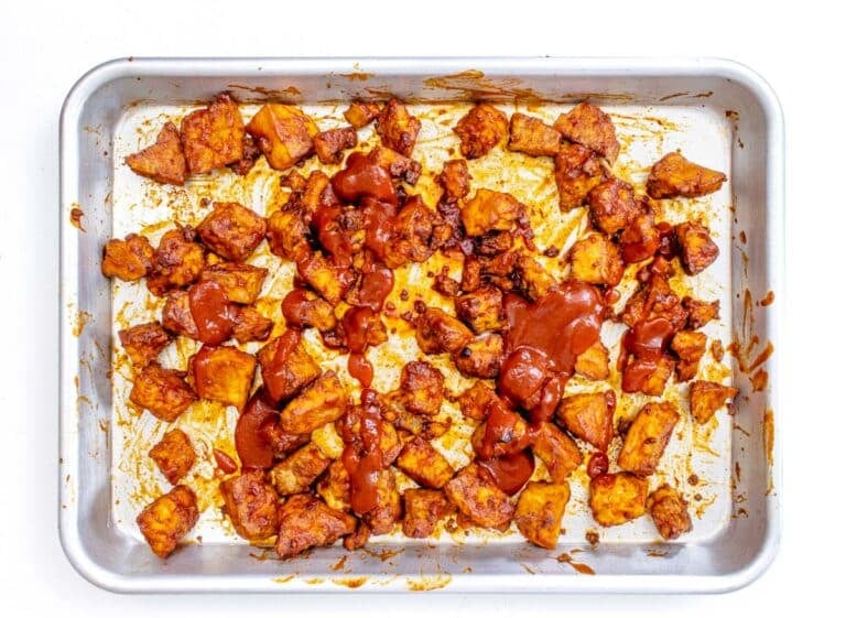 tofu with BBQ sauce on a baking tray