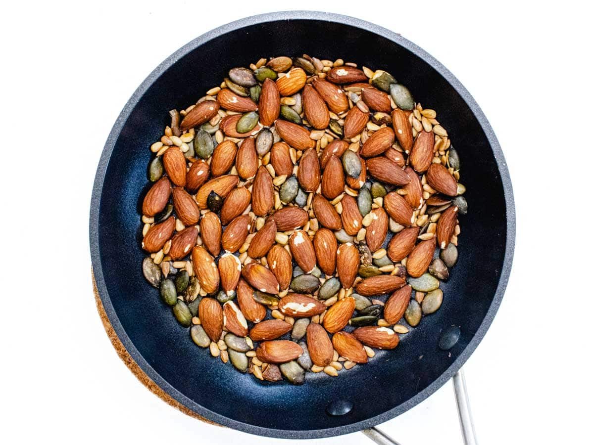 seeds and almonds in a pan