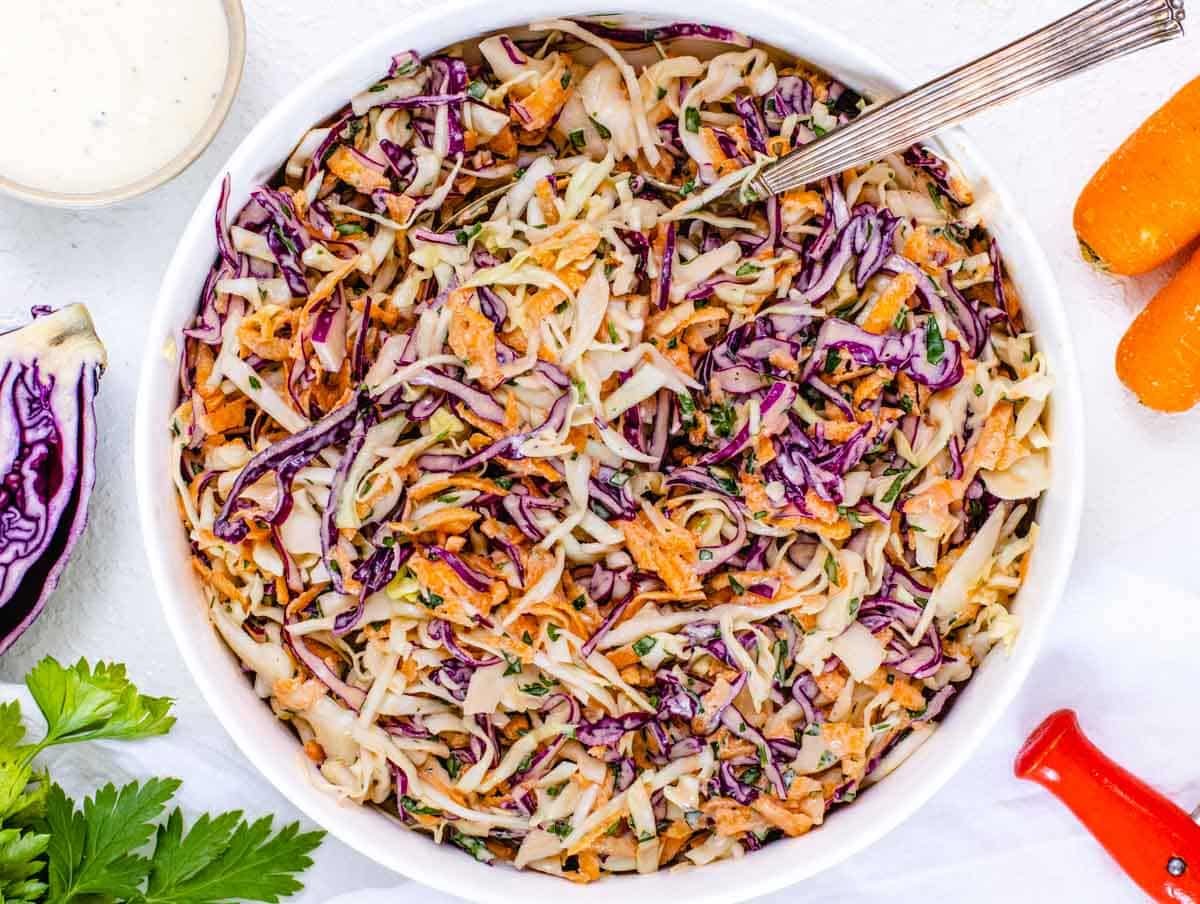 Coleslaw with cabbage and silver spoon