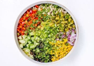 Creamy pasta salad with fresh and pickled vegetables