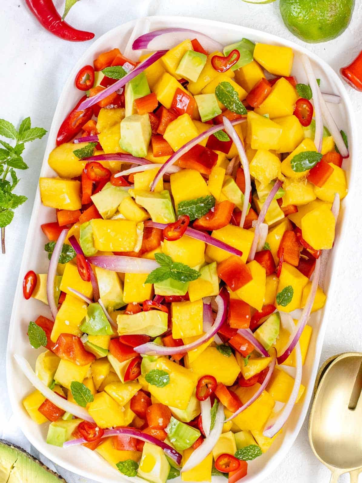 Mango salad on a white platter