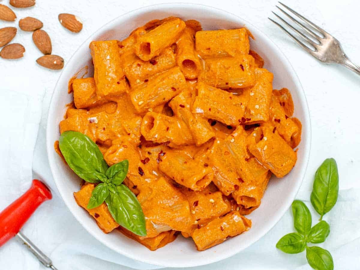 Red Pepper Pasta with fresh basil leaves