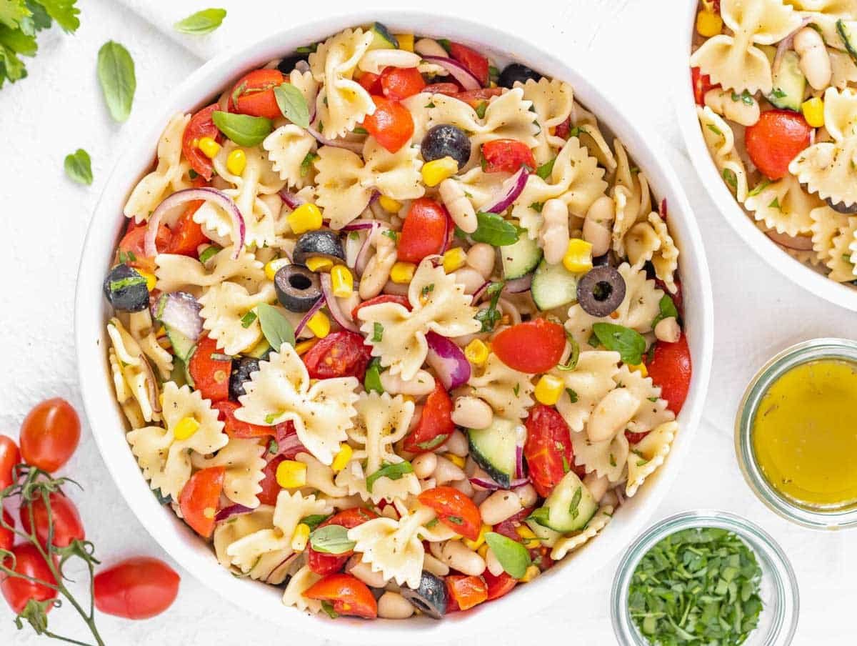 Vegan pasta salad with beans and cherry tomatoes