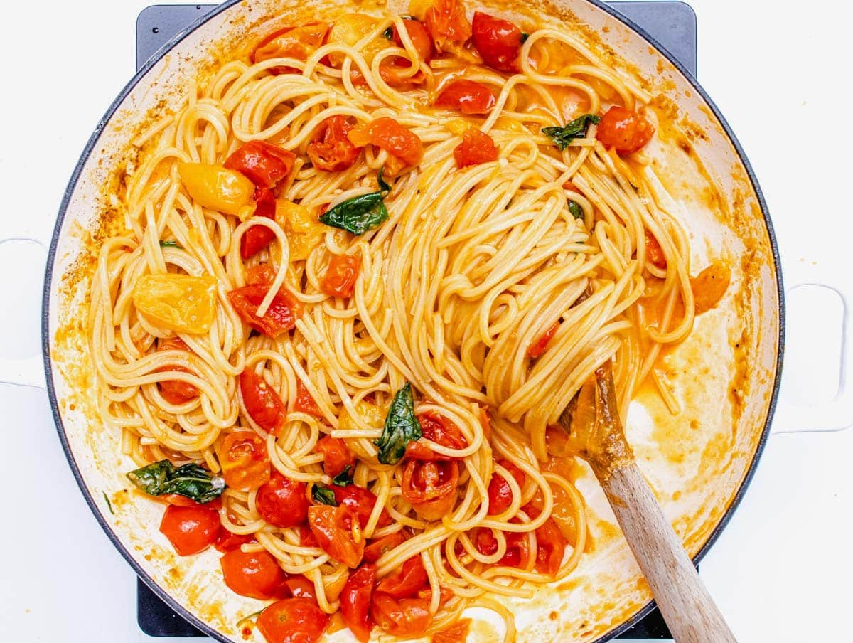 Cherry tomato pasta with wooden fork