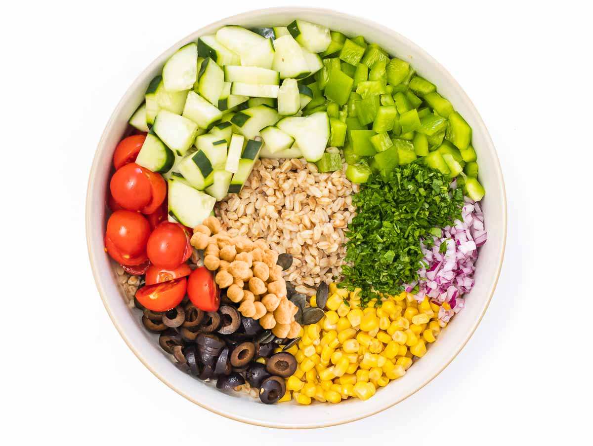 Farro salad ingredients in a bowl