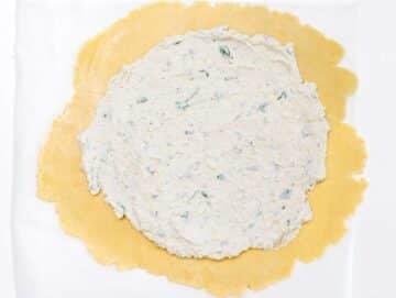 flattened pie crust with ricotta mix